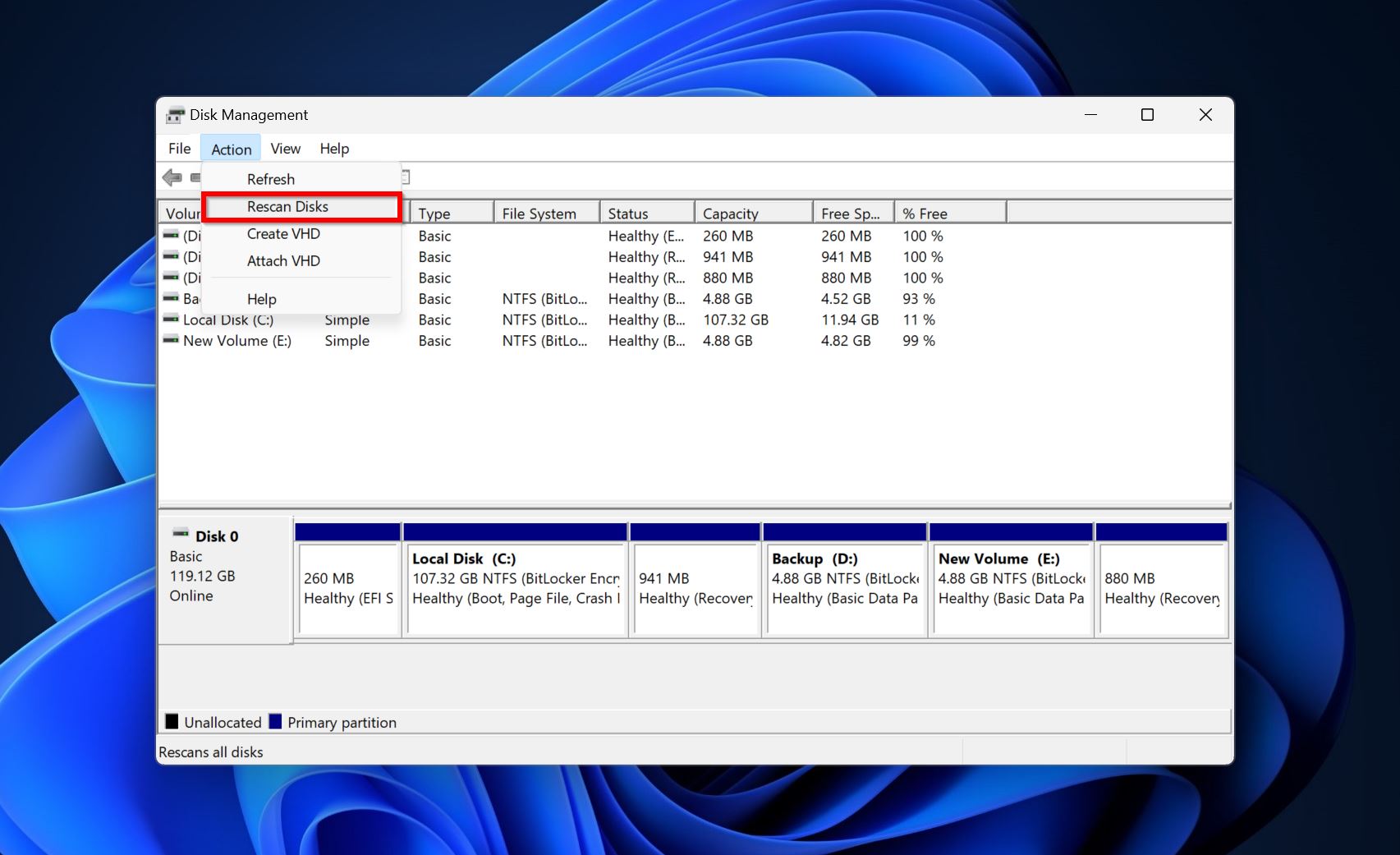 Screenshot of Disk Management in Windows showing the "Action" menu open, with the "Rescan Disks" option highlighted.